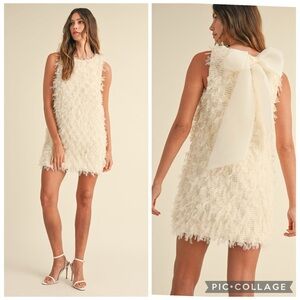 Chic Cream Textured Mini Dress with Bow